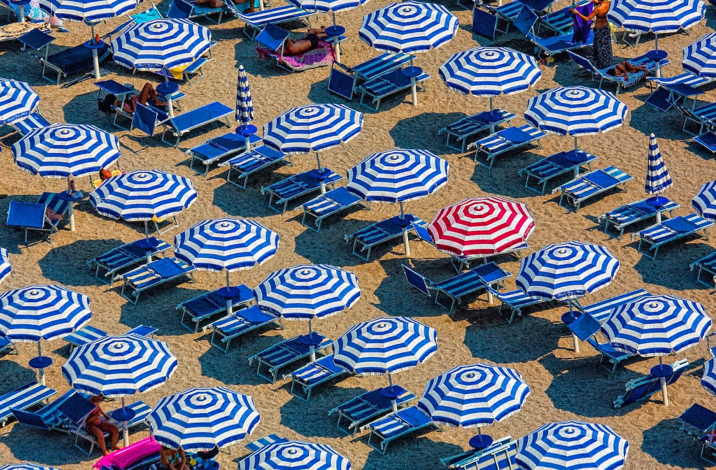 Overhead photo of umbrellas on a beach.